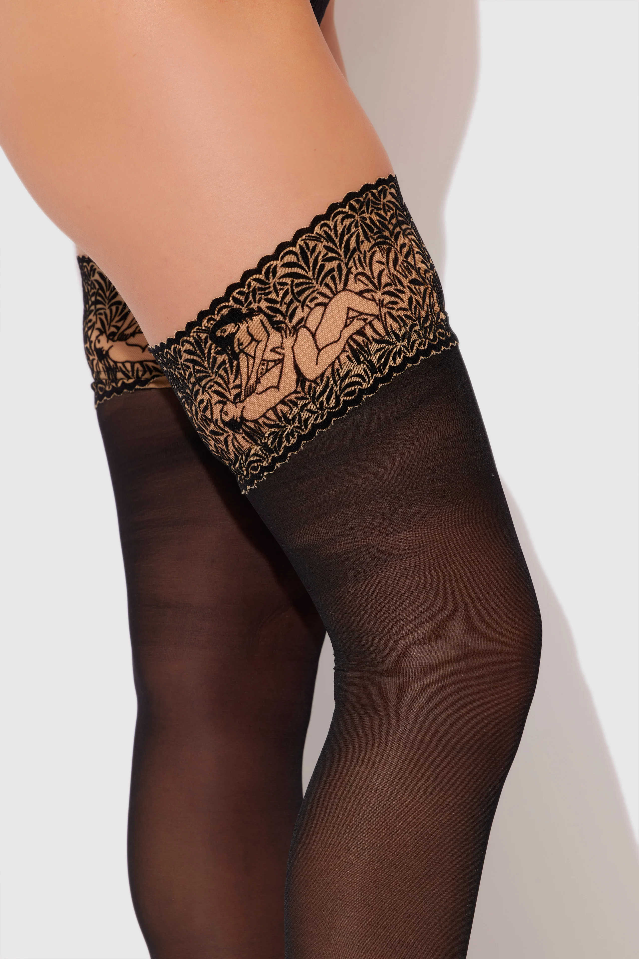 Frederick's of Hollywood Sexual & Sheer Stay Up Thigh Highs in Black Light